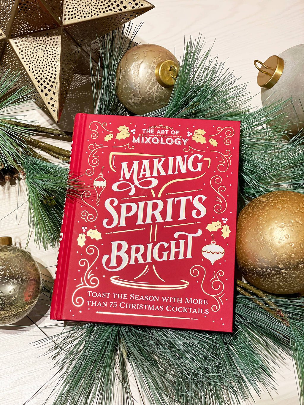 Art of Mixology: Making Spirits Bright Christmas Cocktails book by Cottage Door Press, featuring festive cocktail recipes and holiday themes.