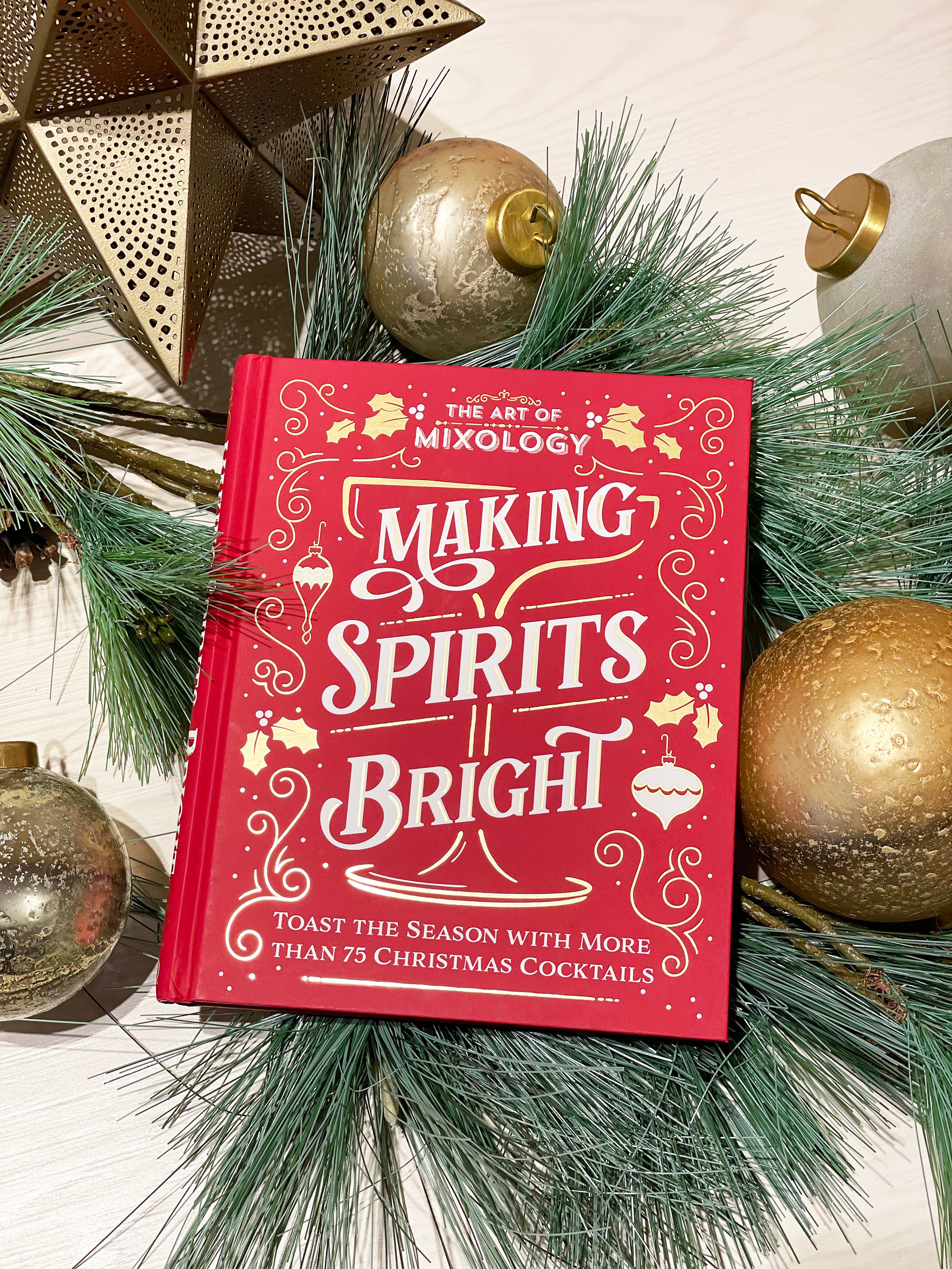 Art of Mixology: Making Spirits Bright Christmas Cocktails book by Cottage Door Press, featuring festive cocktail recipes and holiday themes.