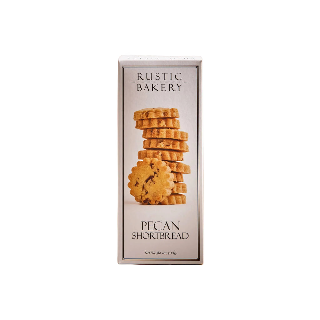 Rustic Bakery Pecan Shortbread Cookies displayed on a plate, showcasing golden-brown, buttery cookies with pecan pieces.