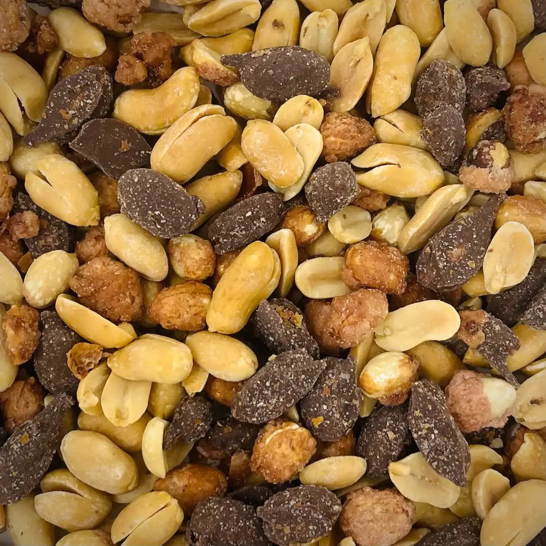 Belmont Peanuts Holiday Classic Mix snack bowl with mixed nuts and candies, perfect for festive gatherings.
