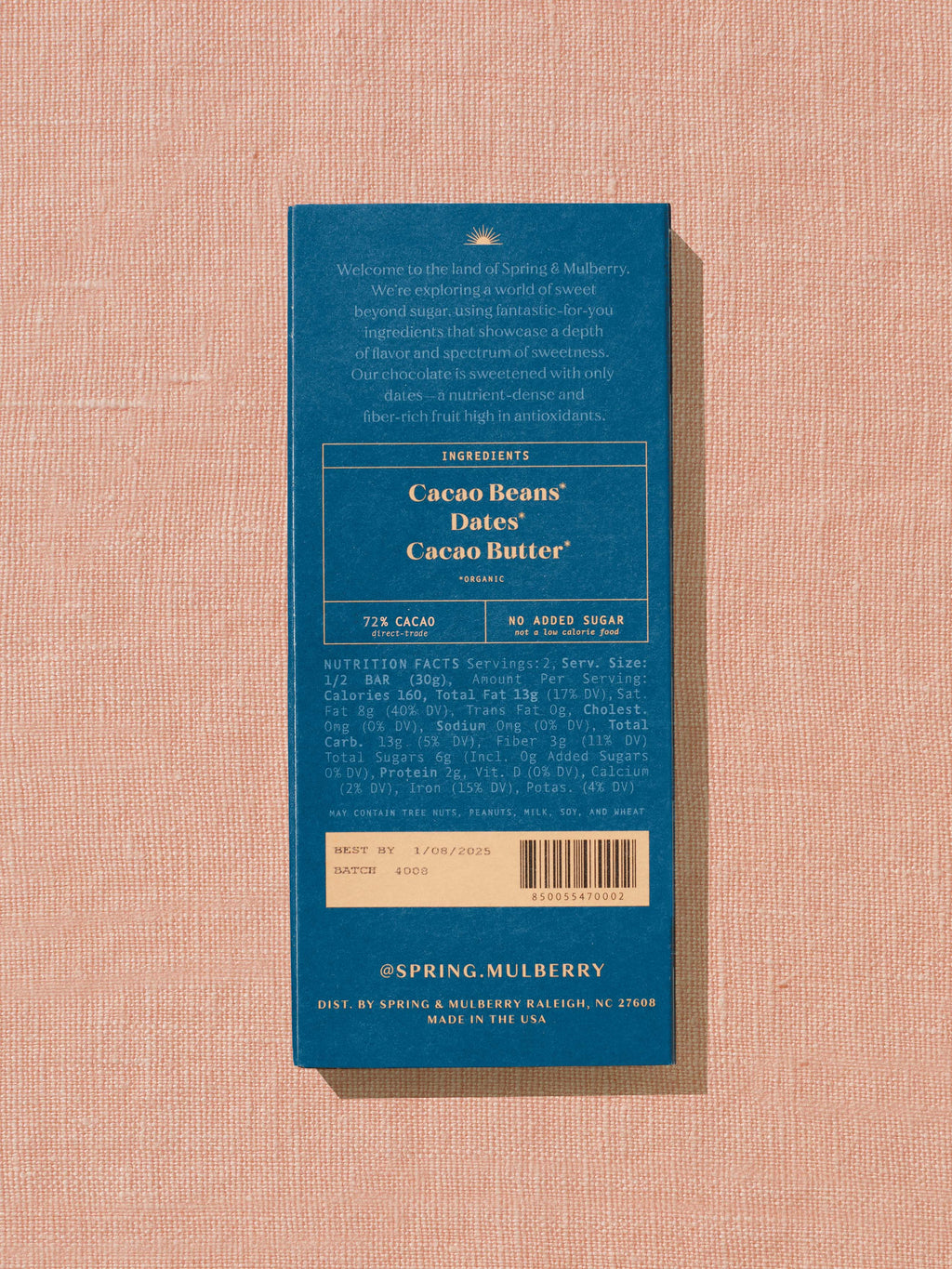 Blue chocolate bar packaging with text on a beige background