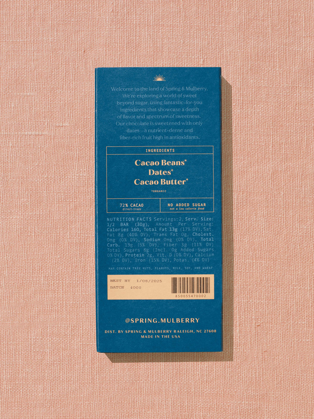 Blue chocolate bar packaging with text on a beige background