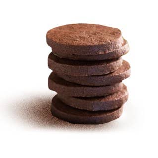 Lady Joseph dark chocolate shortbread cookies on a white plate, showcasing rich chocolate flavor and crumbly texture.