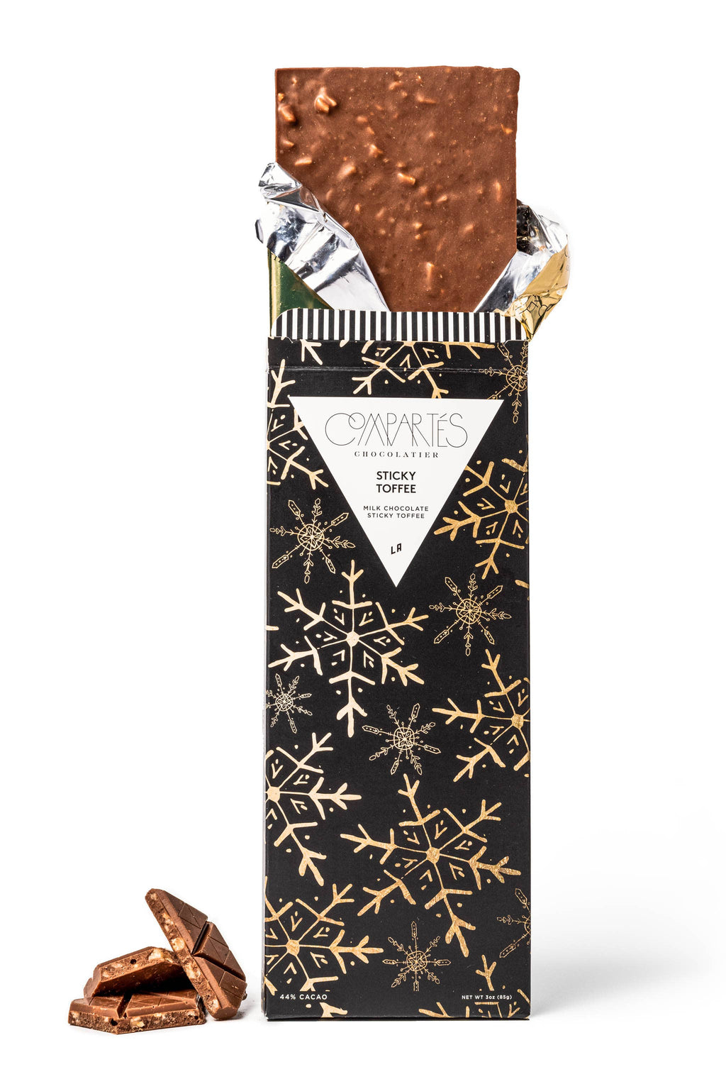 Compartes Sticky Toffee Milk Chocolate Bar, creamy milk chocolate with sticky toffee filling, wrapped in colorful packaging.