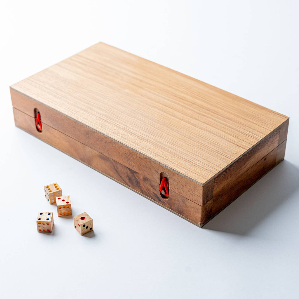Backgammon Mangowood game set by Verve Culture, featuring a handcrafted wooden backgammon board with game pieces and dice.