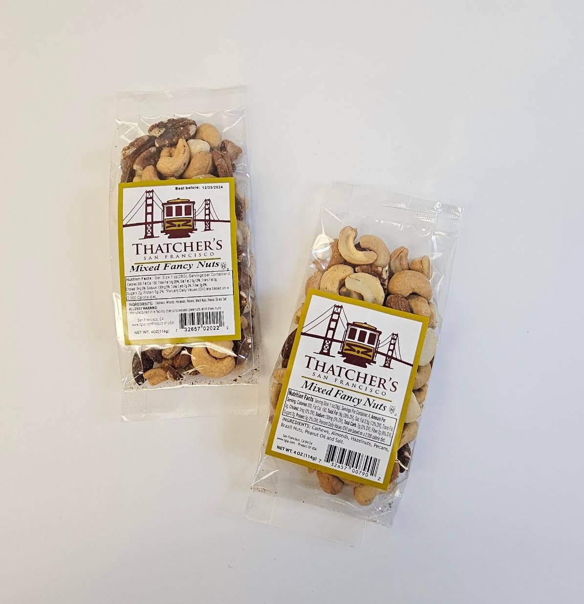 Thatcher's Extra Fancy Mixed Nuts in a 4oz package, featuring a variety of premium nuts from Thatcher's Gourmet Popcorn.