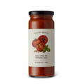 Jar of McEvoy Ranch Basil and Pine Nut Pomodoro Sauce, 16 OZ, a pantry staple with fresh basil and pine nuts.
