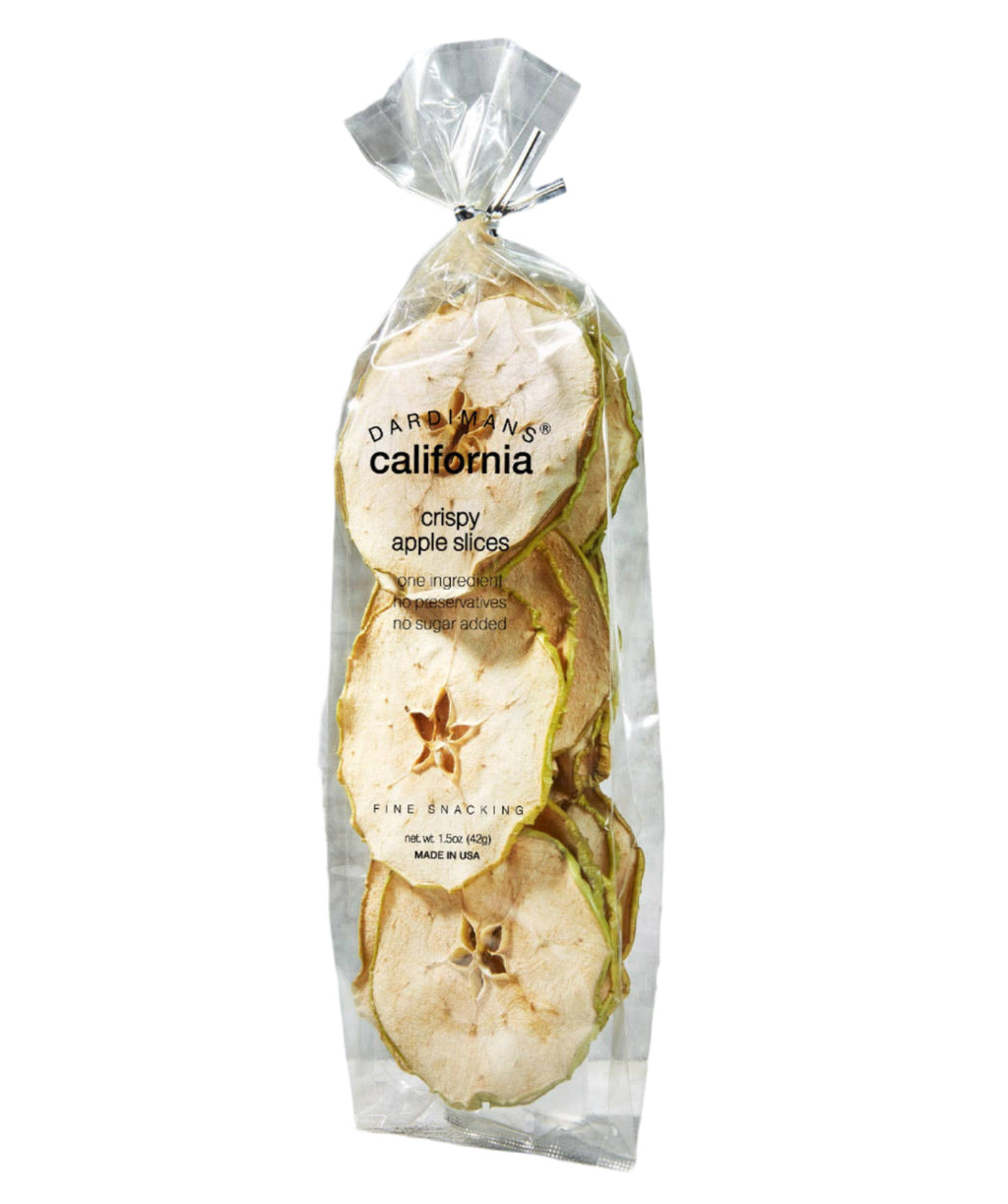 Dardimans California Crisps crispy apple slices snack in a clear bowl, showing thin, dried apple pieces with a golden color.