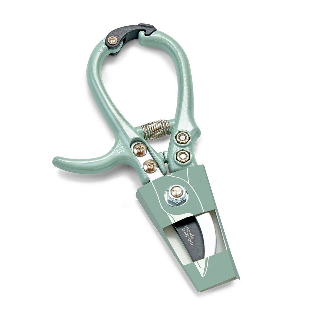 Modern Sprout garden pruners with ergonomic handles and sharp blades for precise cutting of garden plants and shrubs.