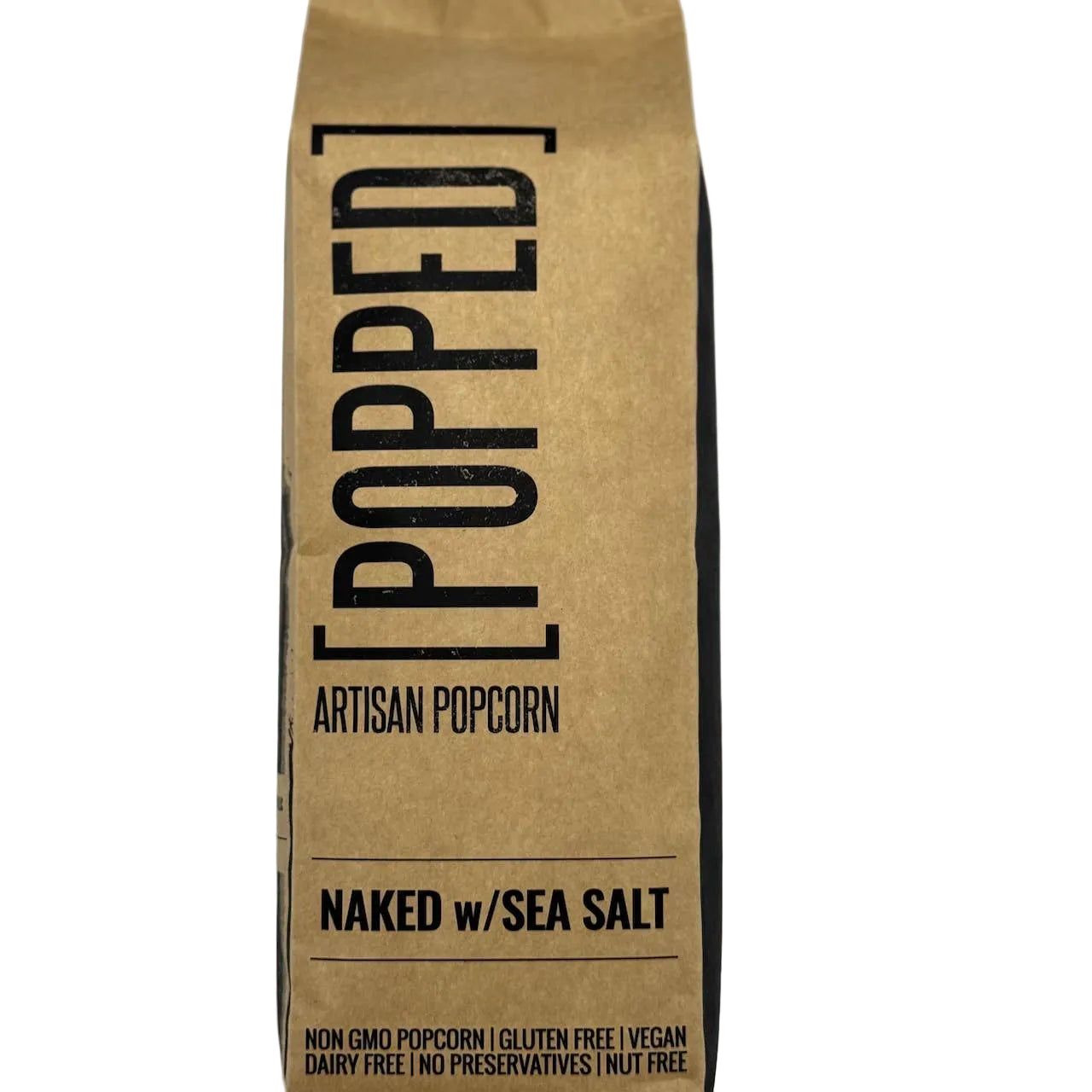 Popped Naked artisan popcorn with sea salt, golden and fluffy, in a clear bowl, served as a salty snack.