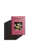 Bahen & Co almond and organic matcha chocolate bar, showing the smooth chocolate with almond pieces and vibrant green matcha accents.