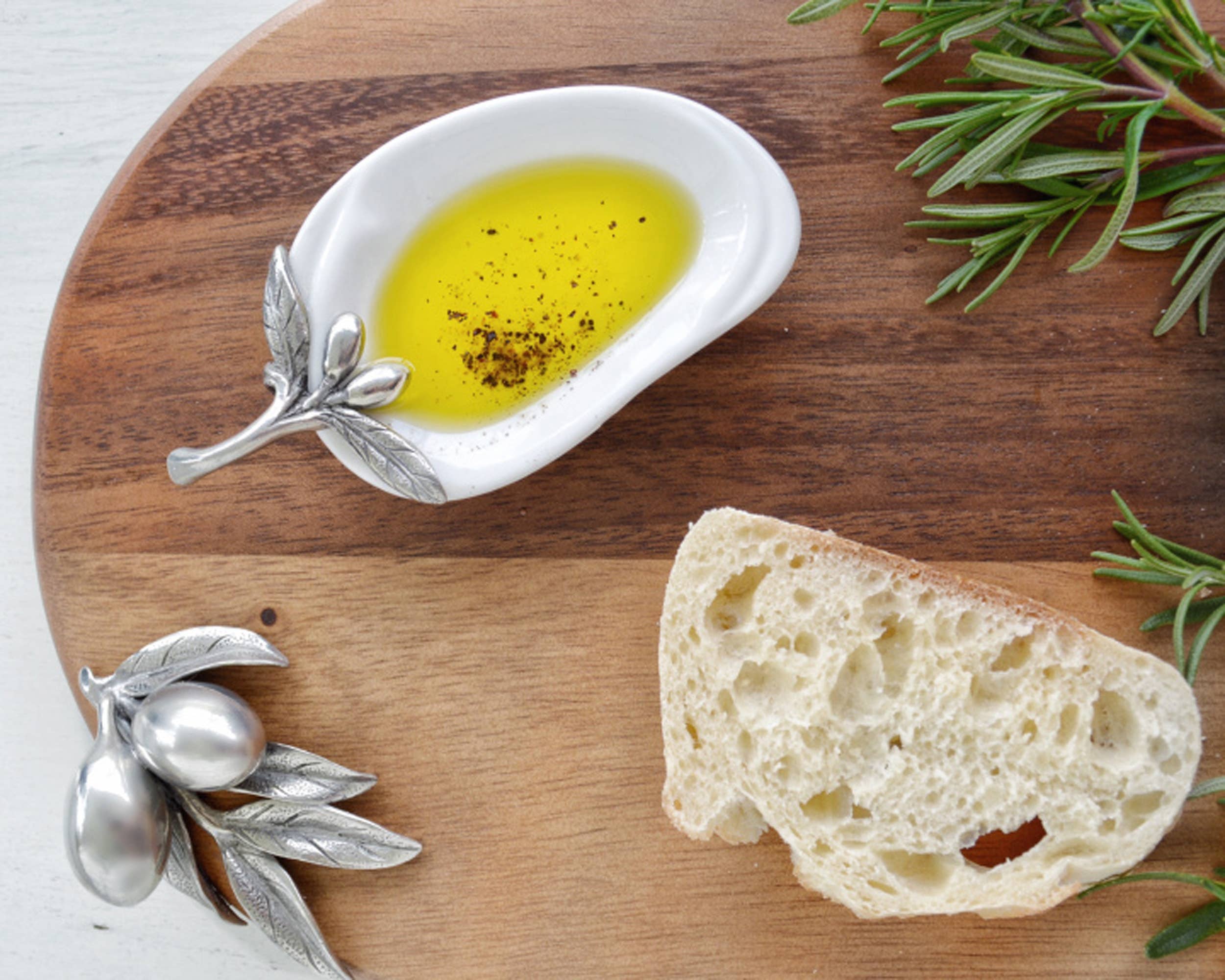 Vagabond House olive oil server in a charcuterie style, featuring a decorative design perfect for serving olive oil.