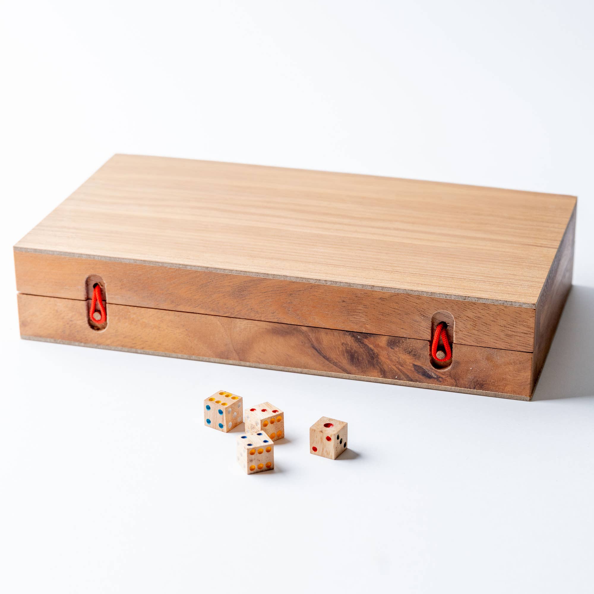 Backgammon game set with mango wood design, featuring game pieces and dice, by Verve Culture for traditional board game play.