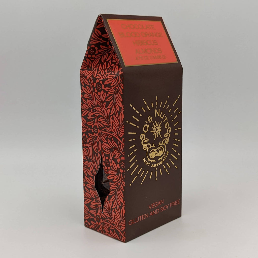Chocolate blood orange hibiscus almonds snack by Q's Nuts, LLC, featuring almonds coated with chocolate, blood orange, and hibiscus.
