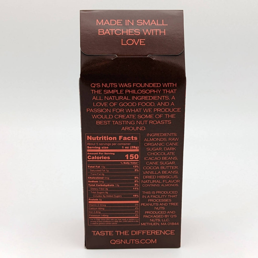 Chocolate blood orange hibiscus almonds snack by Q's Nuts, LLC with visible almonds coated in chocolate and colorful hibiscus pieces.