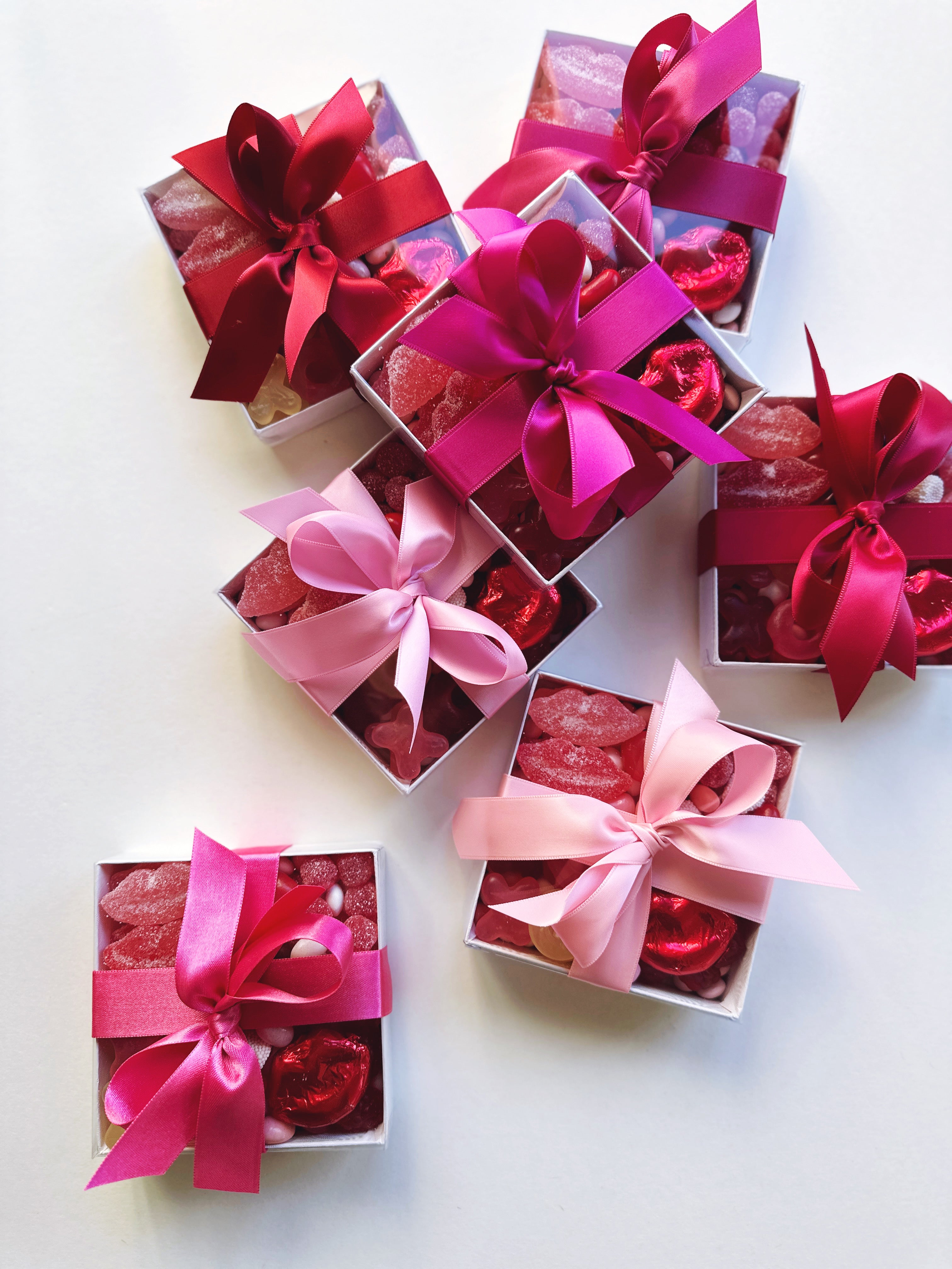 Assorted Poppins & Post Sweetheart Candy Box with chocolates and candies in a decorative box on a white background.