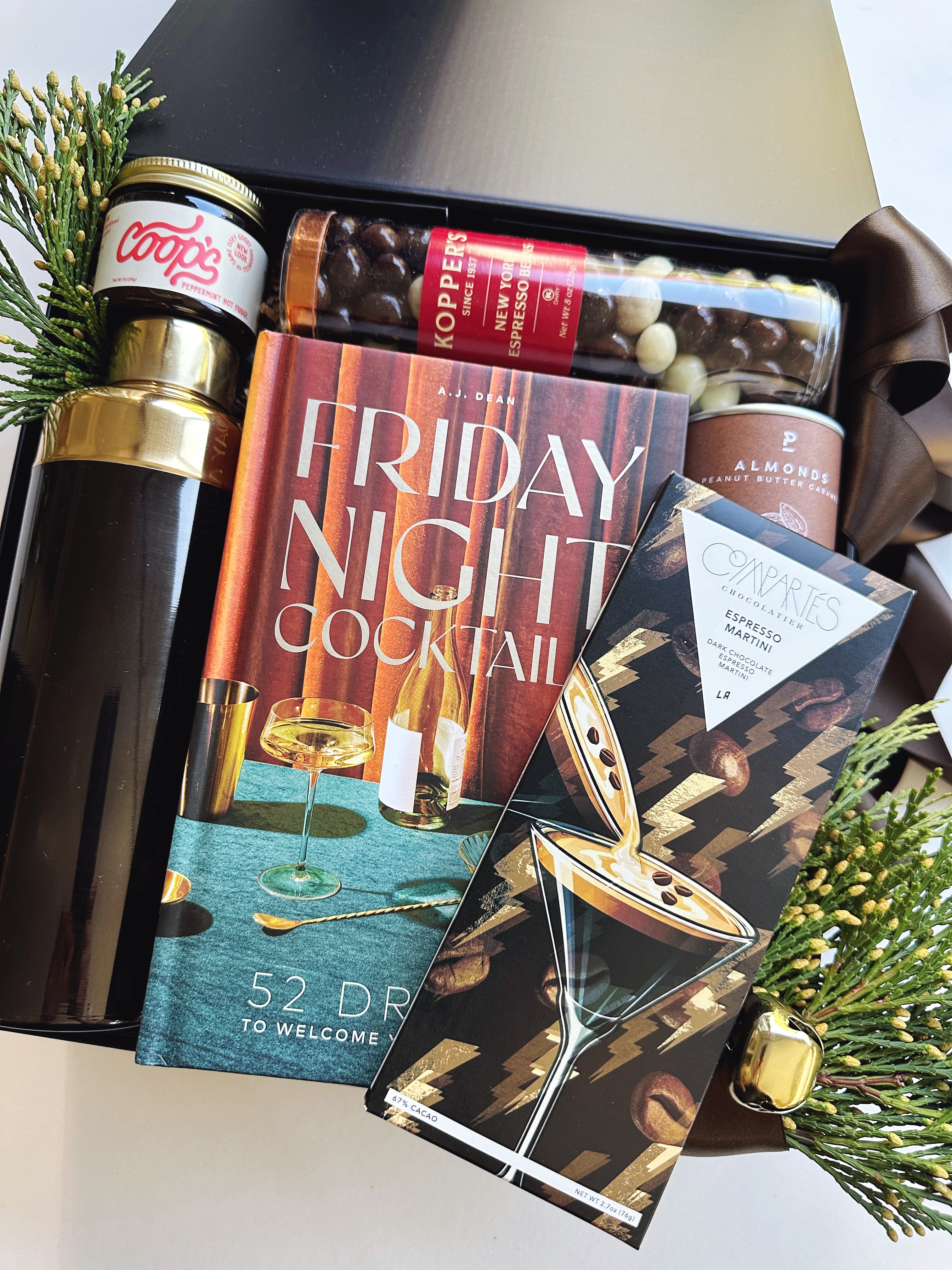 Poppins & Post gift box featuring colorful holiday-themed spirits and festive decorations for celebrating the season