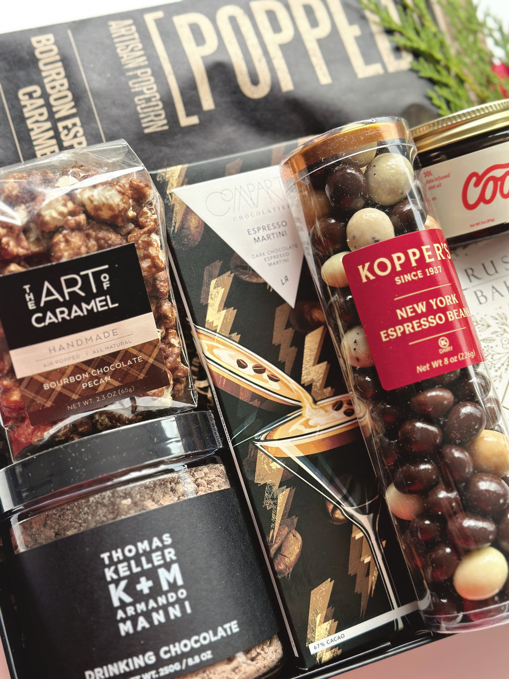 Poppins & Post gift box with espresso and dark chocolate, featuring a stylish arrangement of chocolates and coffee treats.