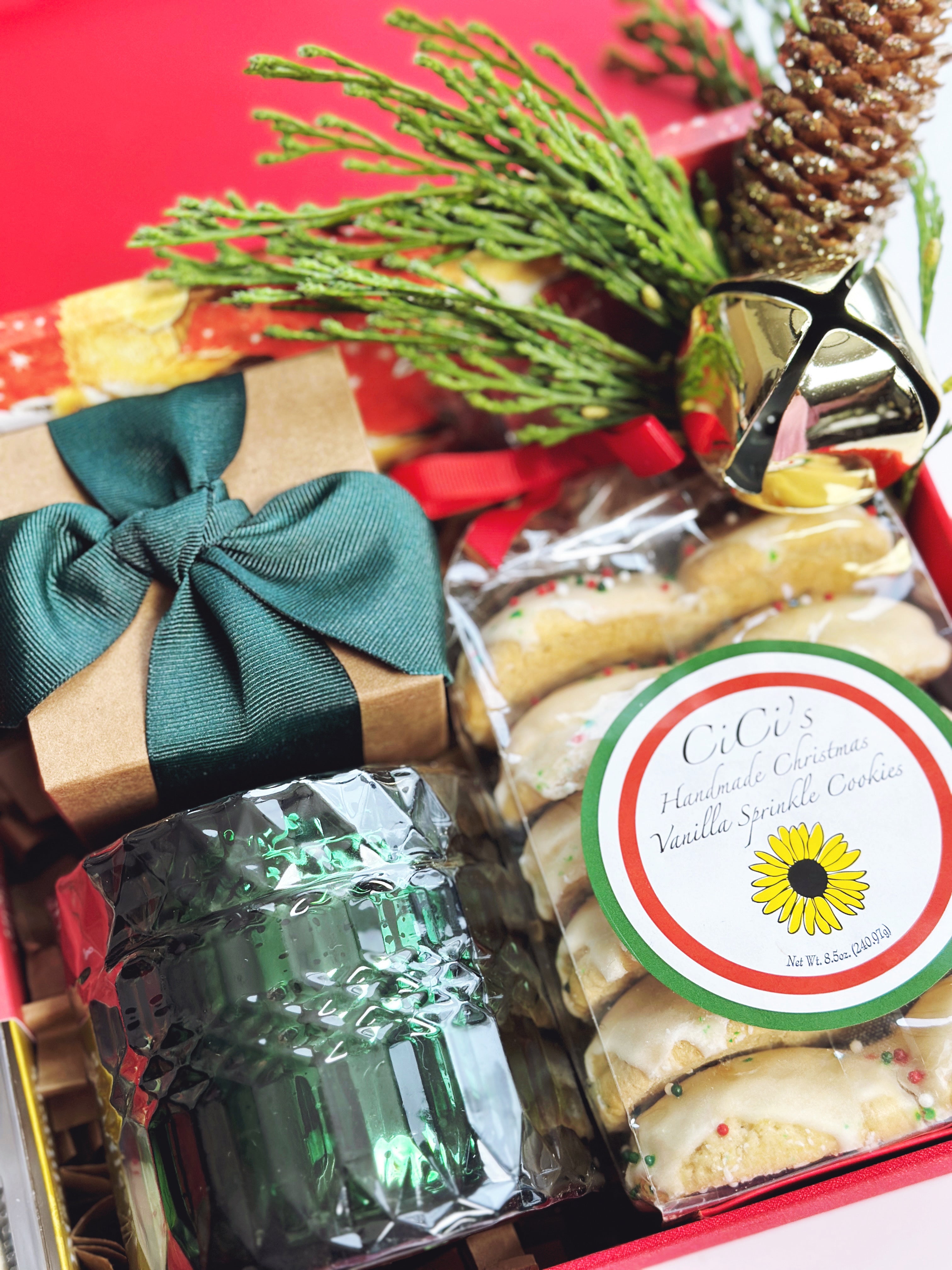 Assorted holiday sweets gift box from Poppins & Post featuring colorful chocolates and festive treats in a decorative box.
