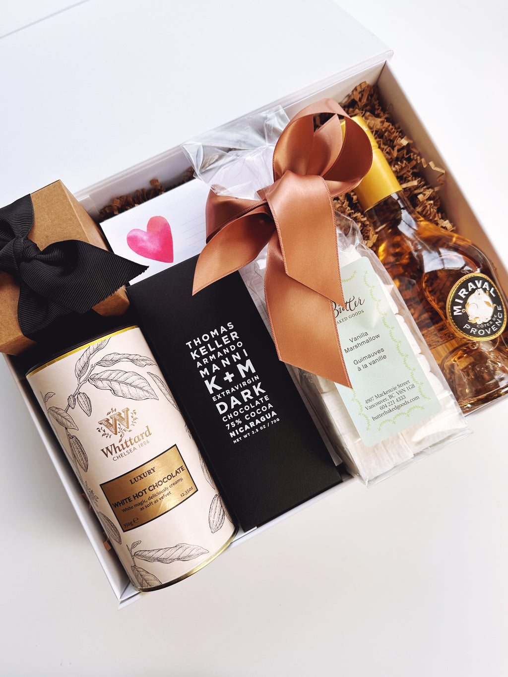 Poppins & Post "Thinking of You" gift box with assorted chocolates and treats in a decorative tin.