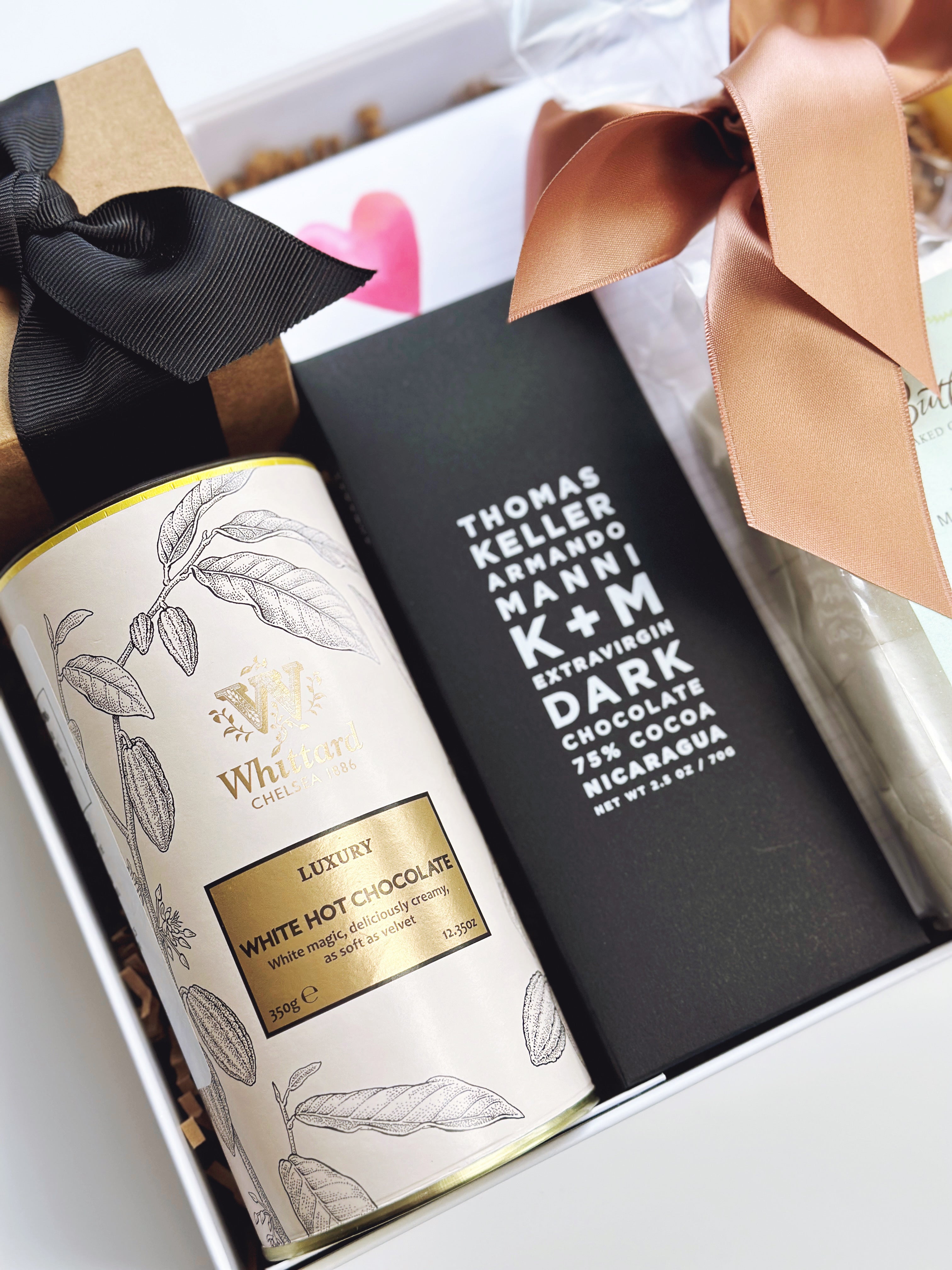 Poppins & Post "Thinking of You" gift box with elegant packaging, featuring assorted treats in a decorative tin.