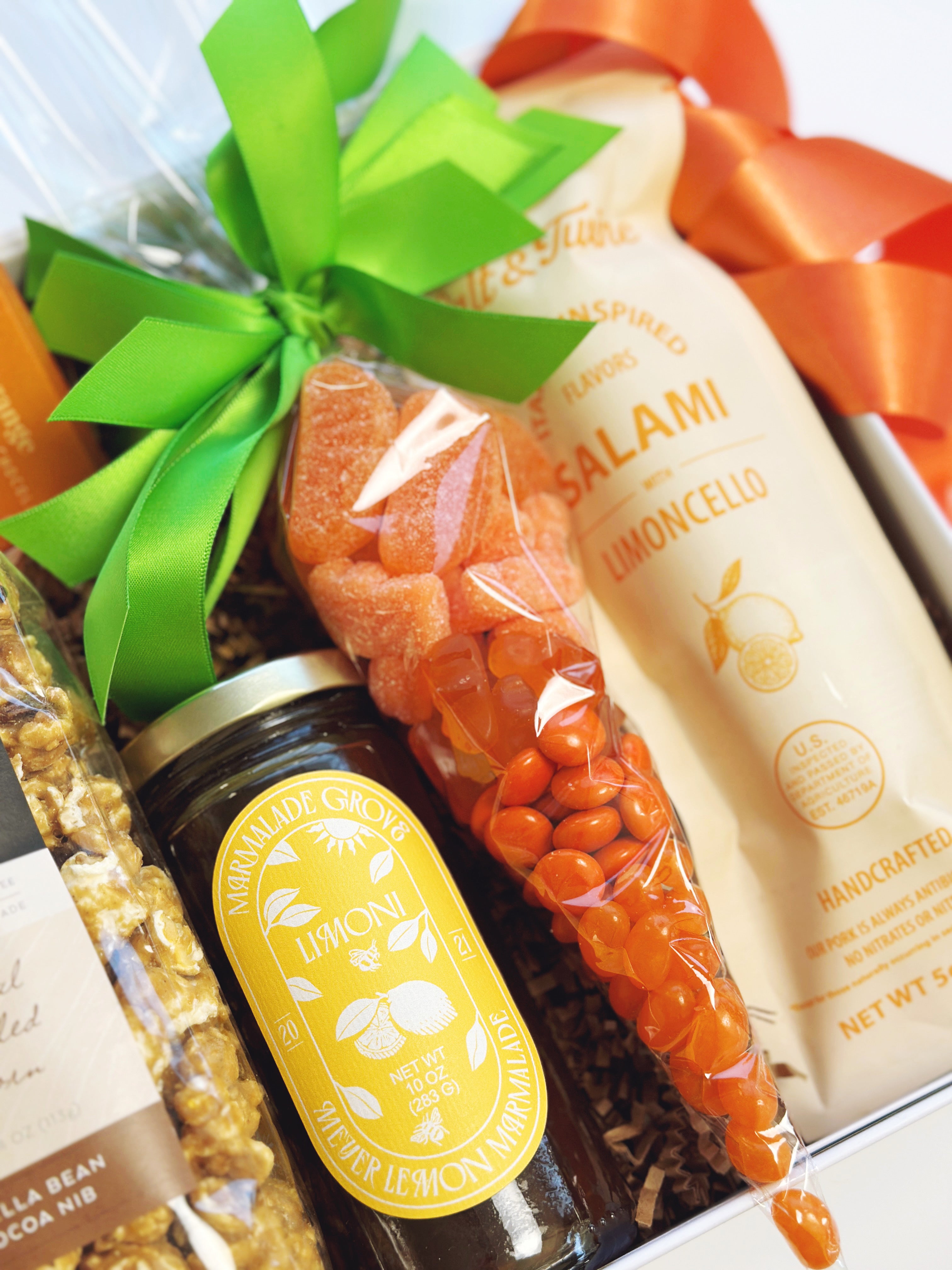 Spring Citrus gift box by Poppins & Post with colorful citrus-themed packaging and fresh citrus fruits.