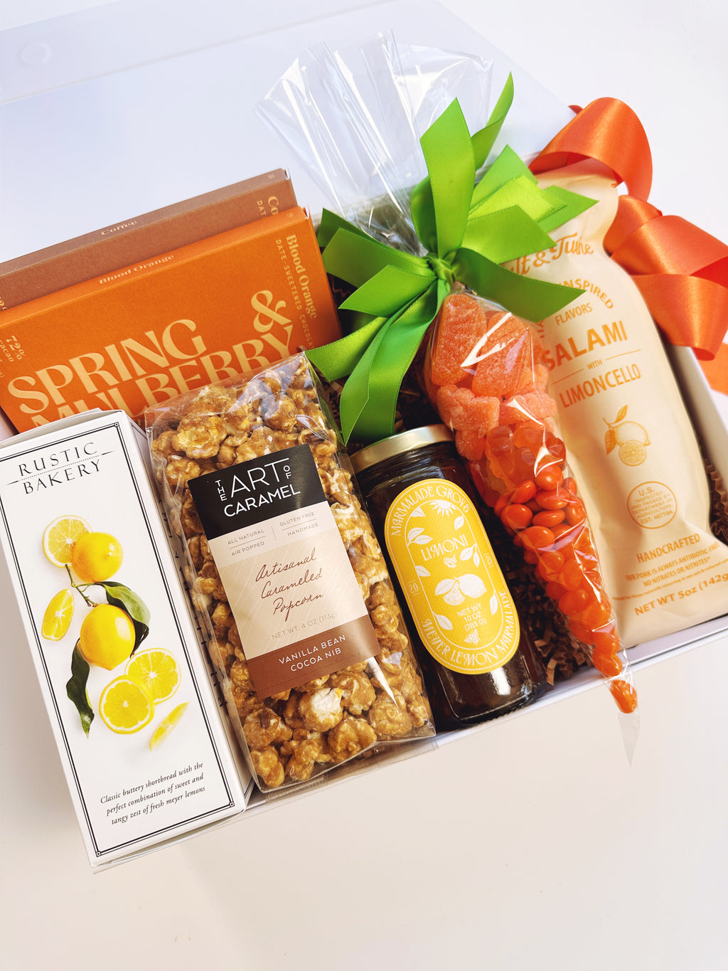 Spring Citrus gift box by Poppins & Post featuring colorful citrus-themed packaging and fresh citrus fruits.