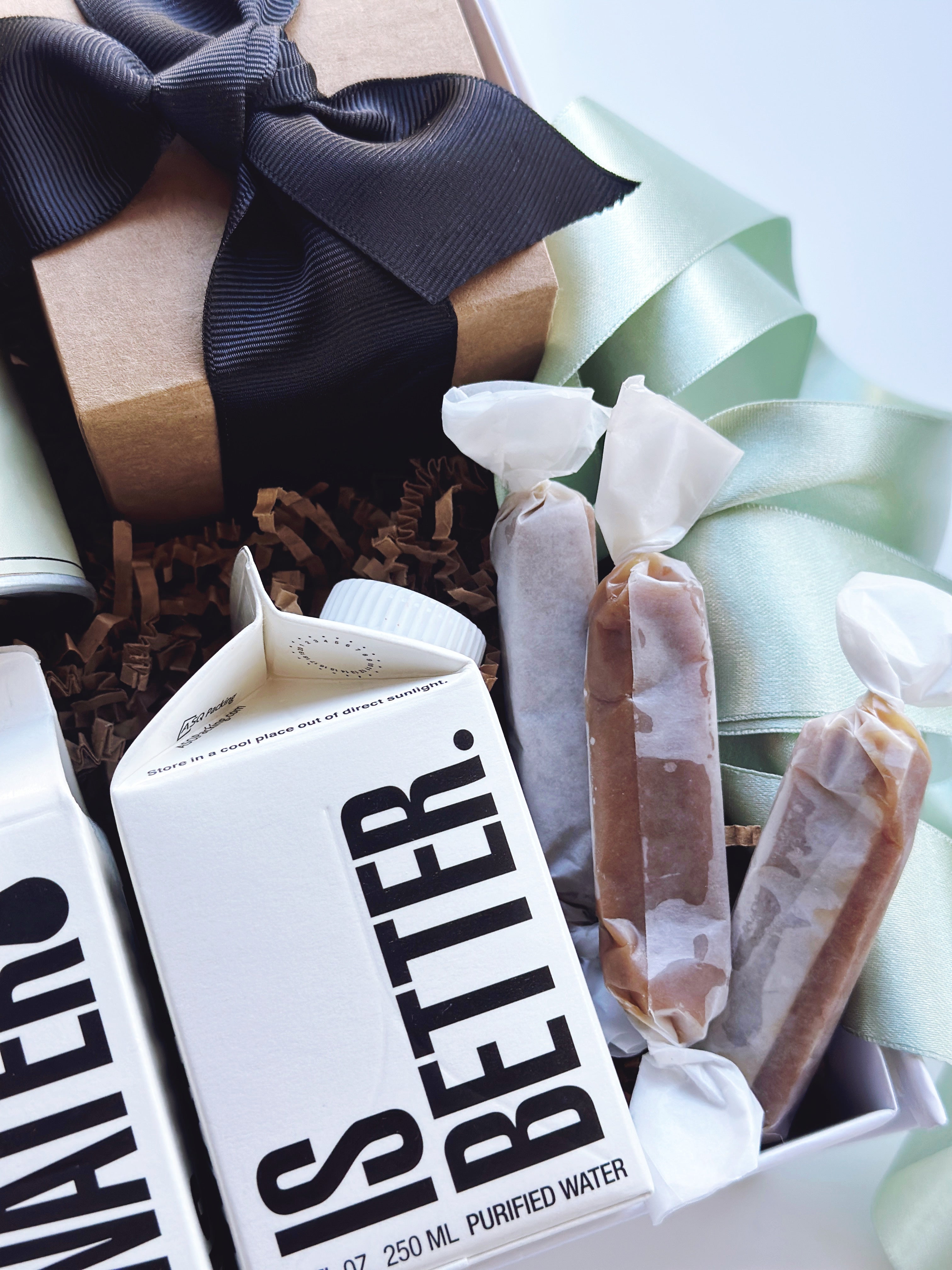 Sweet and salty wedding welcome gift set by Poppins & Post, featuring assorted treats and personalized favors for guests.