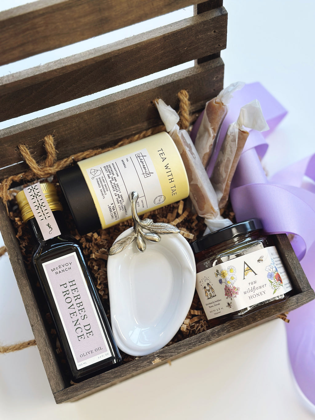 Spring Gourmet Gift Box by Poppins & Post with assorted treats and colorful packaging, perfect for gifting during spring celebrations.
