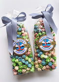 Thatcher's Gourmet Popcorn Spring Mix in an 8oz bag, featuring a colorful blend of seasoned popcorn kernels.