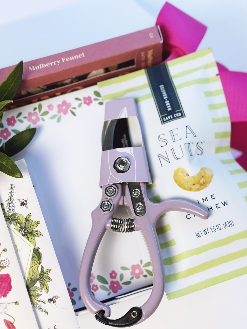 Poppins & Post Gardener's Gift box with gardening tools, gloves, and plant seeds in a decorative gift box.