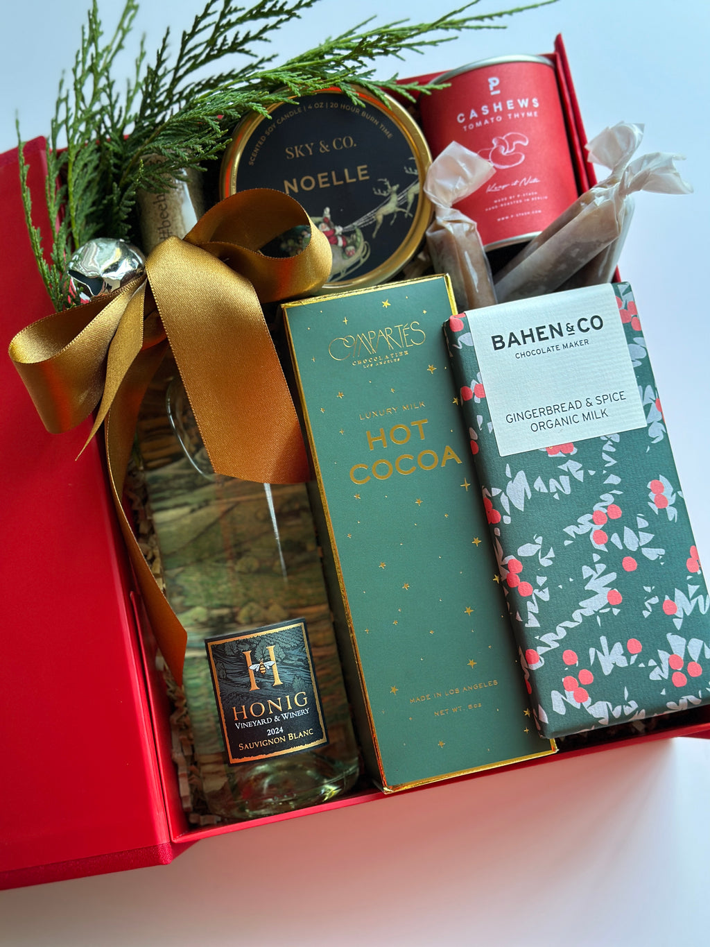 Decorative Holly Berry gift box from Poppins & Post, featuring festive red berries and green foliage in a holiday-themed tin.