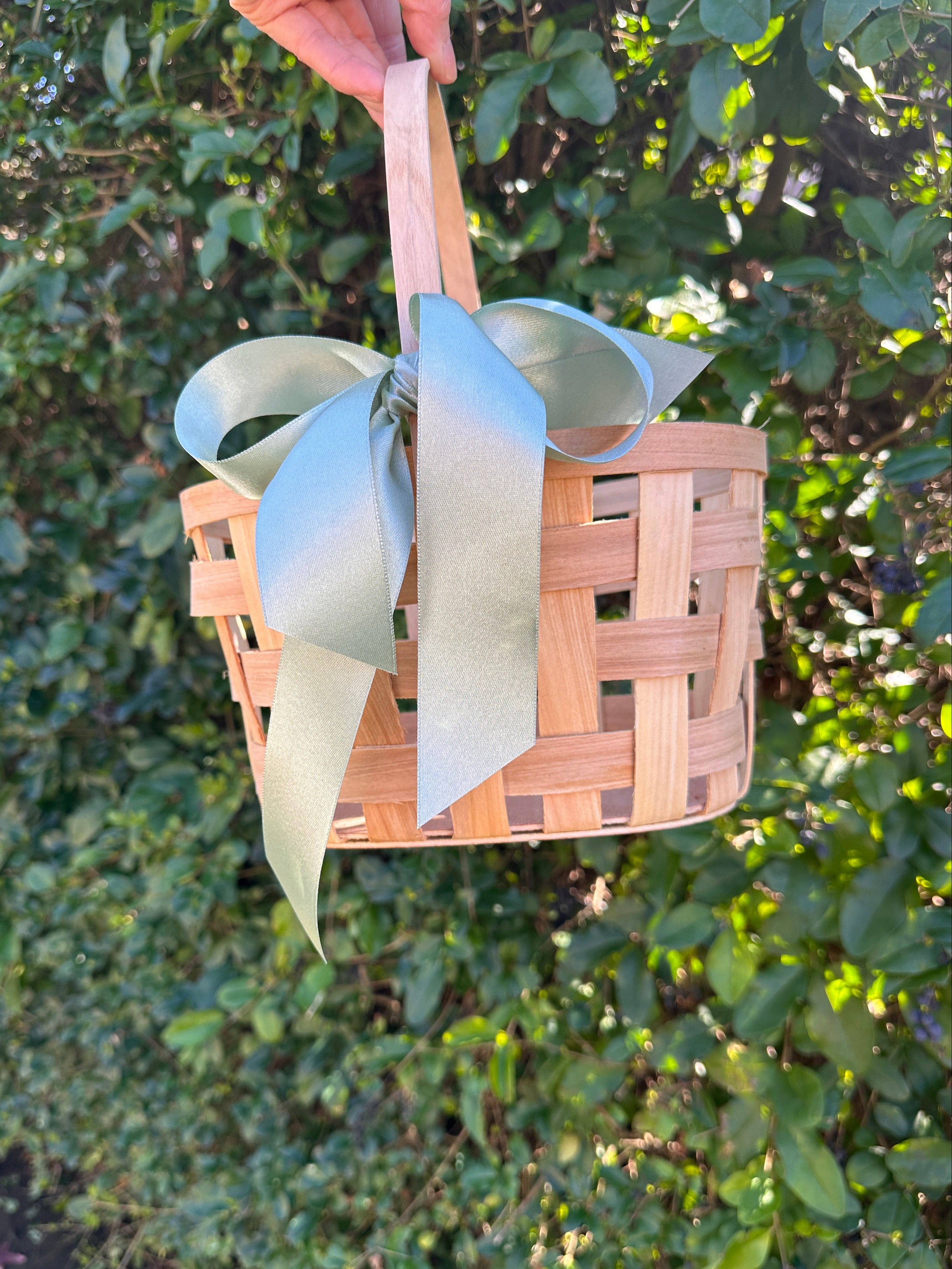 Small gift basket from Poppins & Post with assorted treats and decorative wrapping, perfect for gifting occasions.