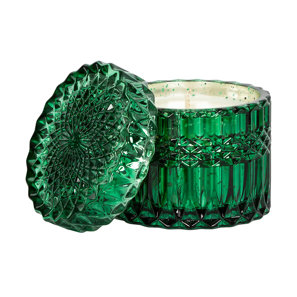 Gift-wrapped crystal candle from Poppins & Post featuring mistletoe design, elegant and decorative candle for special occasions.