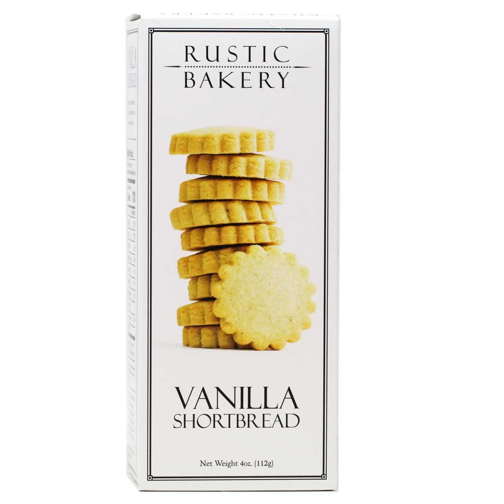 Rustic Bakery vanilla bean shortbread cookies on a plate, showcasing their golden-brown appearance and classic rectangular shape.