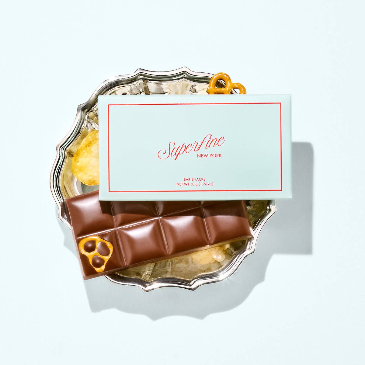 Assorted Superfine Chocolate and candy bar snacks featuring colorful packaging and a variety of sweet treats.