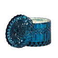 Blue Spruce Crystal Candle from The SOi Company featuring a clear glass holder and a blue spruce scented wax candle.