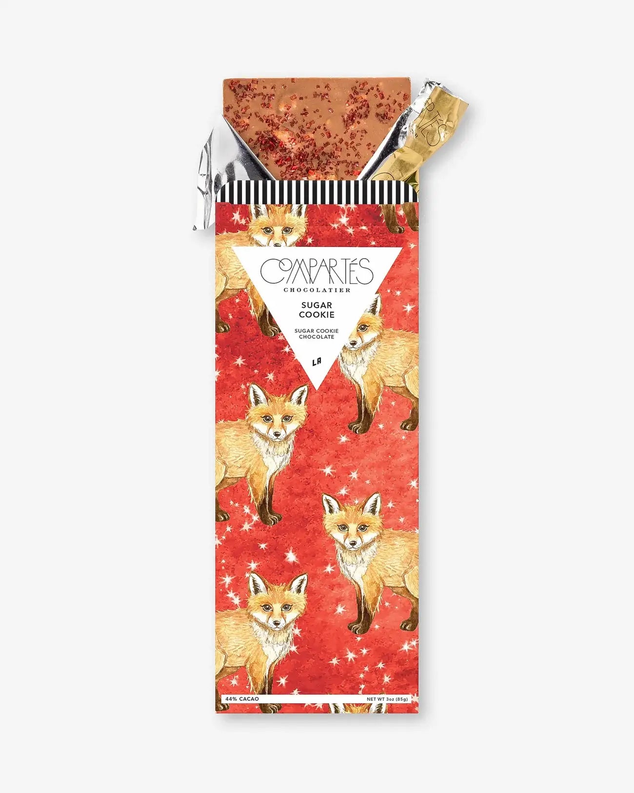 Compartes Sugar Cookie Chocolate Bar featuring a creamy chocolate coating with sugar cookie pieces on top.