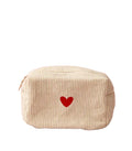 Heart-shaped makeup bag by Poppins & Post for bath and body essentials, featuring a cute heart design and zip closure.