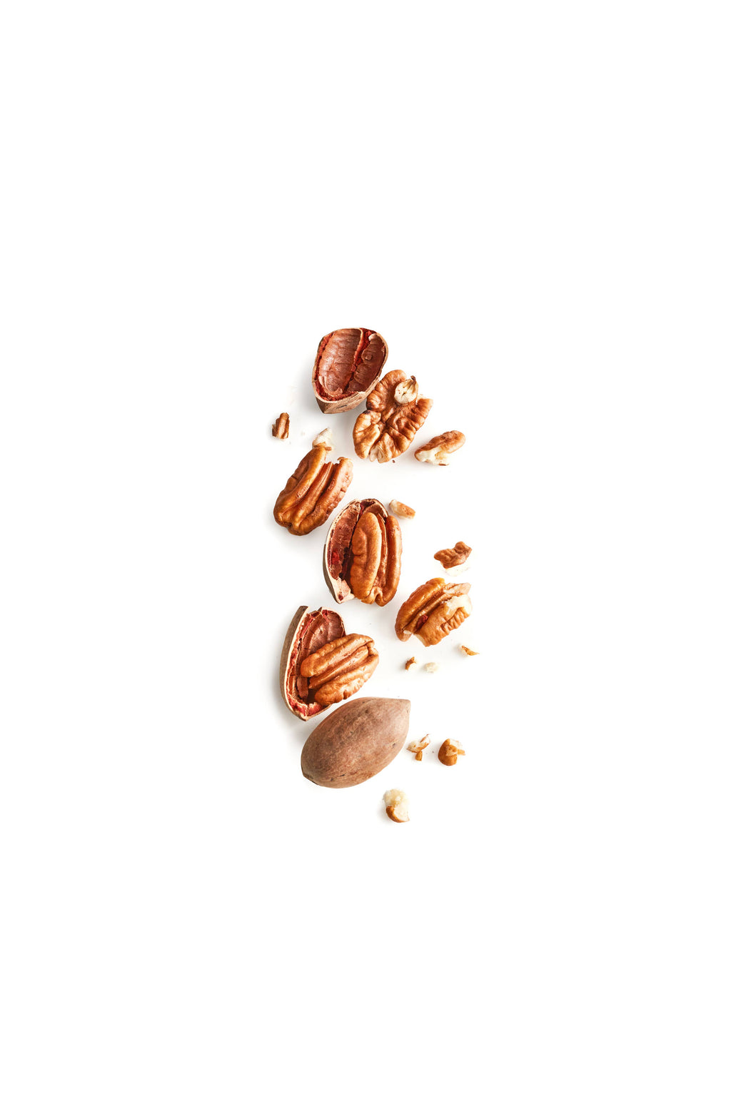 Rustic Bakery Pecan Shortbread Cookies on a plate, showing golden-brown, buttery cookies with chopped pecans visible.