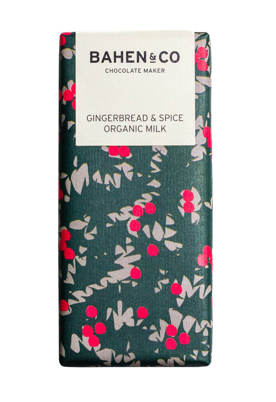 Bahen & Co. Gingerbread & Spice Organic Milk Chocolate bar with textured surface and festive packaging detail.