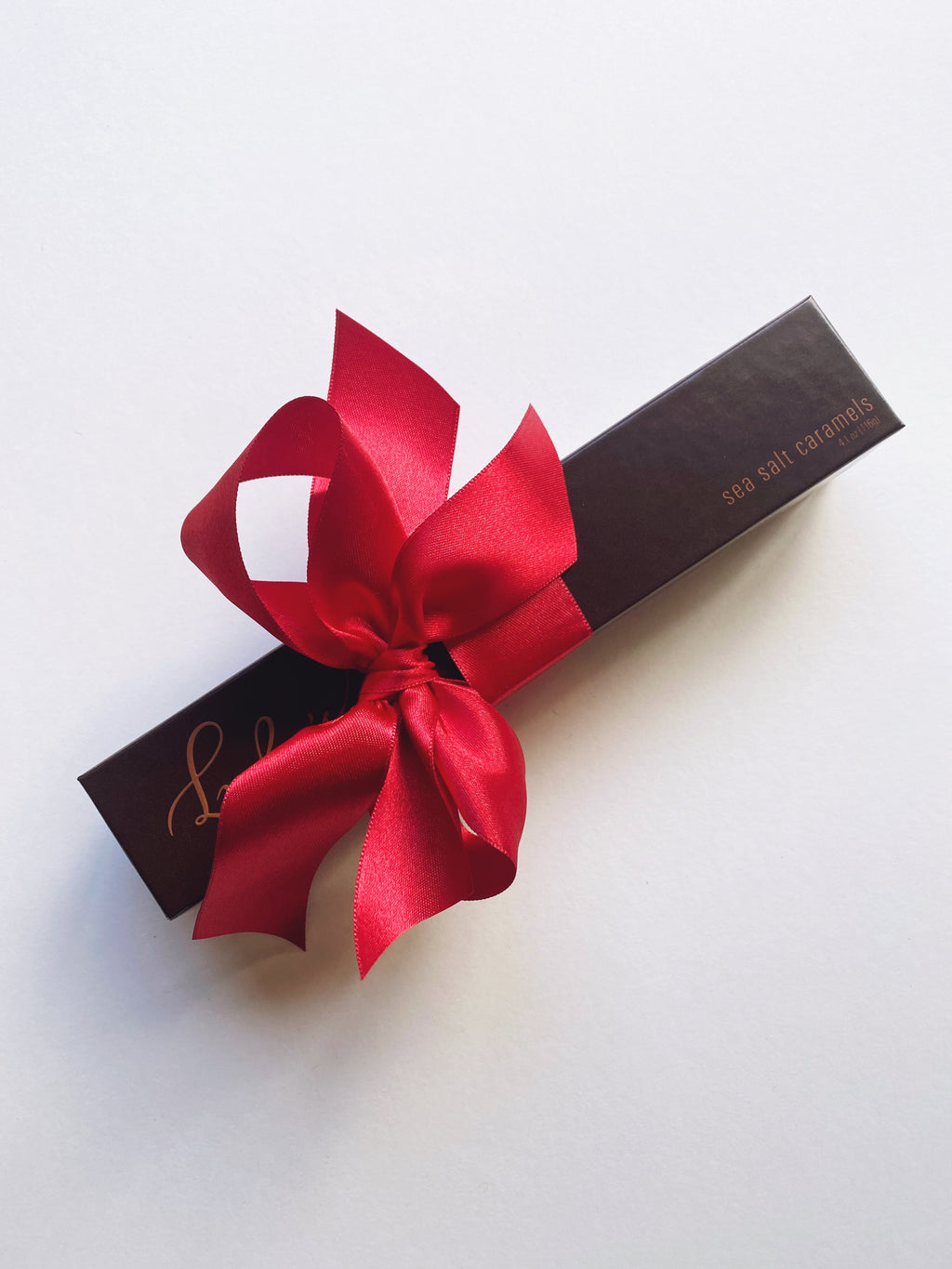 Set of 10 Lula's Sea Salt Chocolates from Poppins & Post, beautifully packaged welcome gift with artisanal sea salt chocolates.