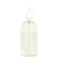 Liquid Marseille hand soap with cotton flower scent from COMPAGNIE DE PROVENCE, showing a clear bottle with white soap and floral label